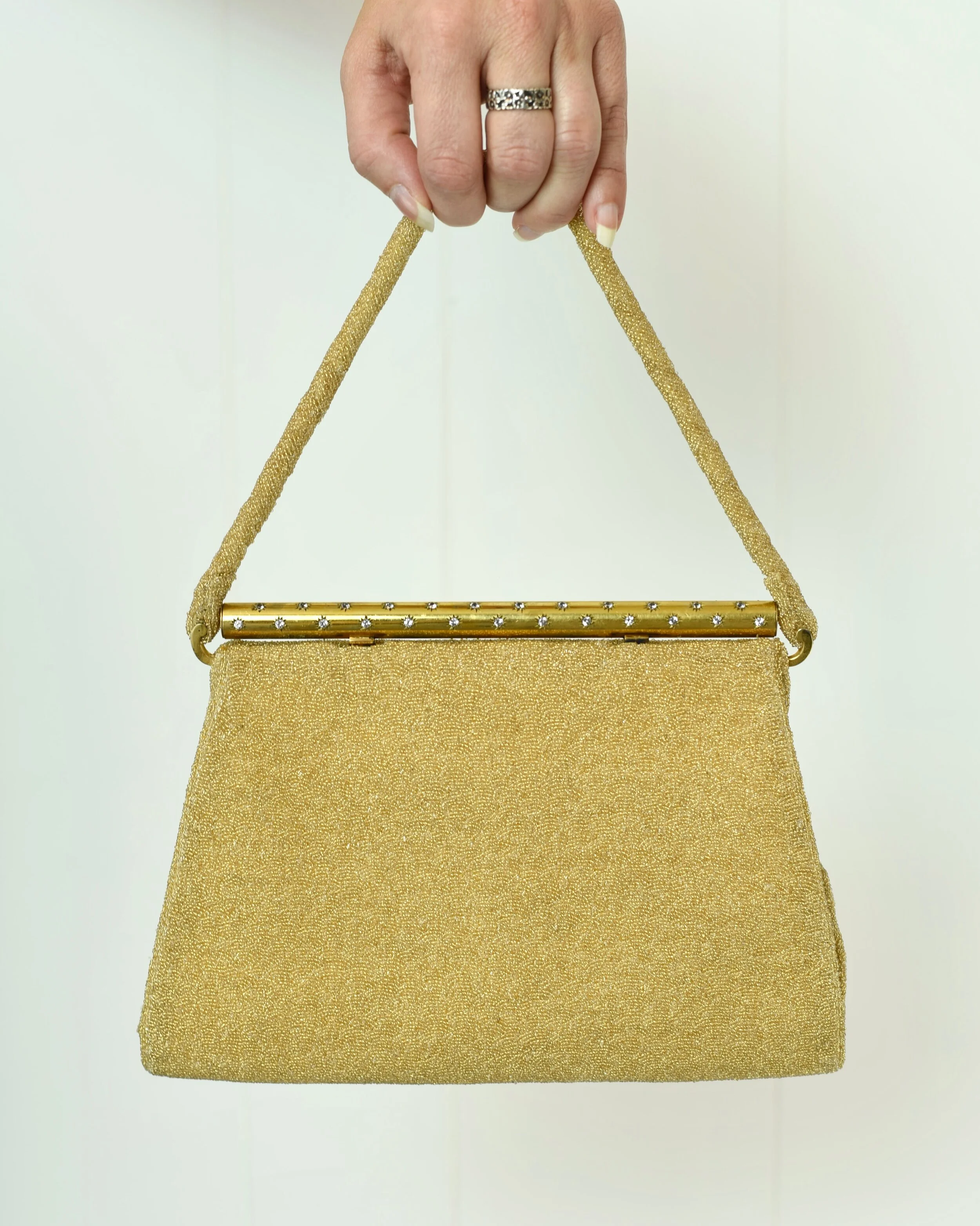 Gold beaded sales clutch bag